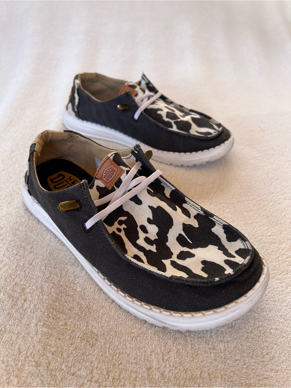 HEY DUDE BLACK WHITE COW PRINT WENDY CANVAS SLIP ON SHOES SIZE 9